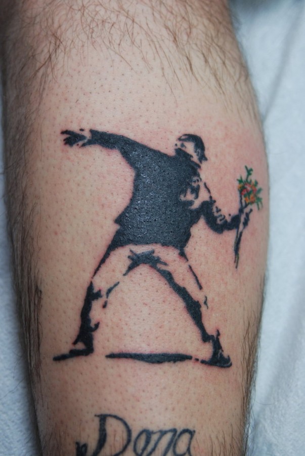 Bansky guy throwing flowers tattoo