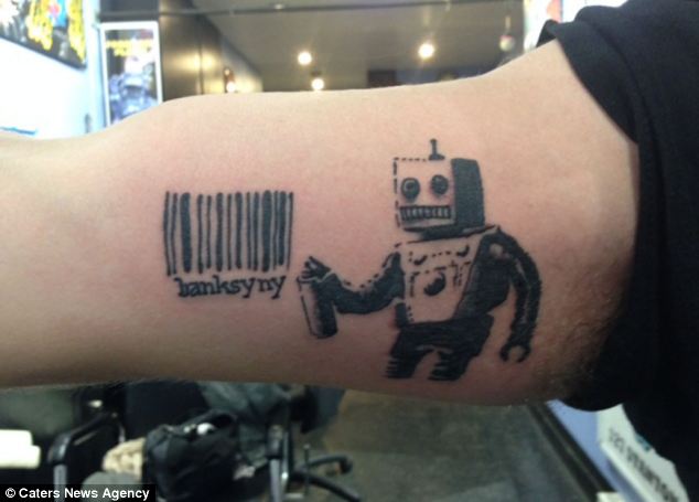 Bansky robot tattoo