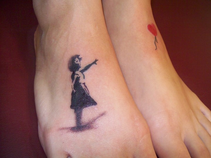 Bansky tattoo on foot