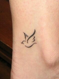 Beautiful simple bird tattoo