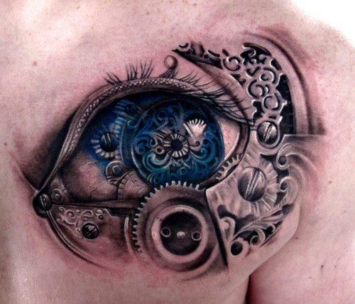 Biomechanical blue eye tattoo on shoulder