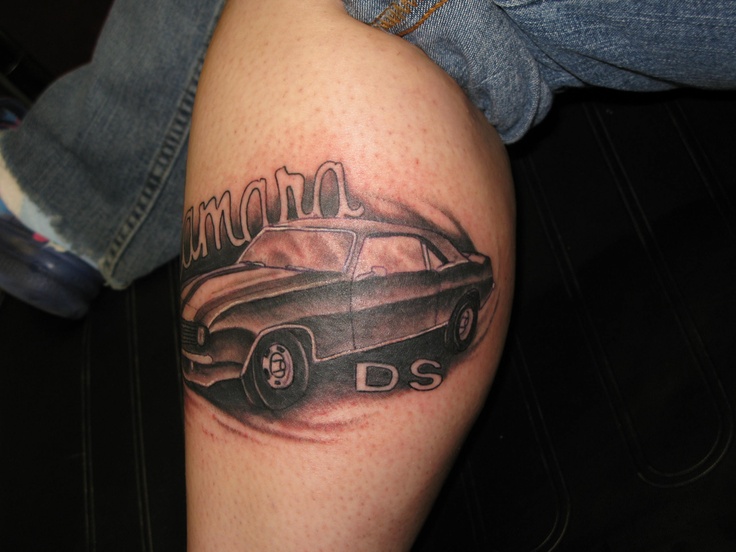 Black DS style car tattoo on leg