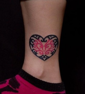 Black and pink heart tattoo