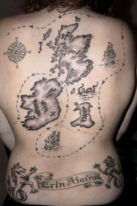 Black and white map tattoo on back