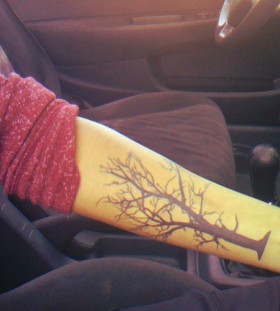 Black awesome tree tattoo on arm