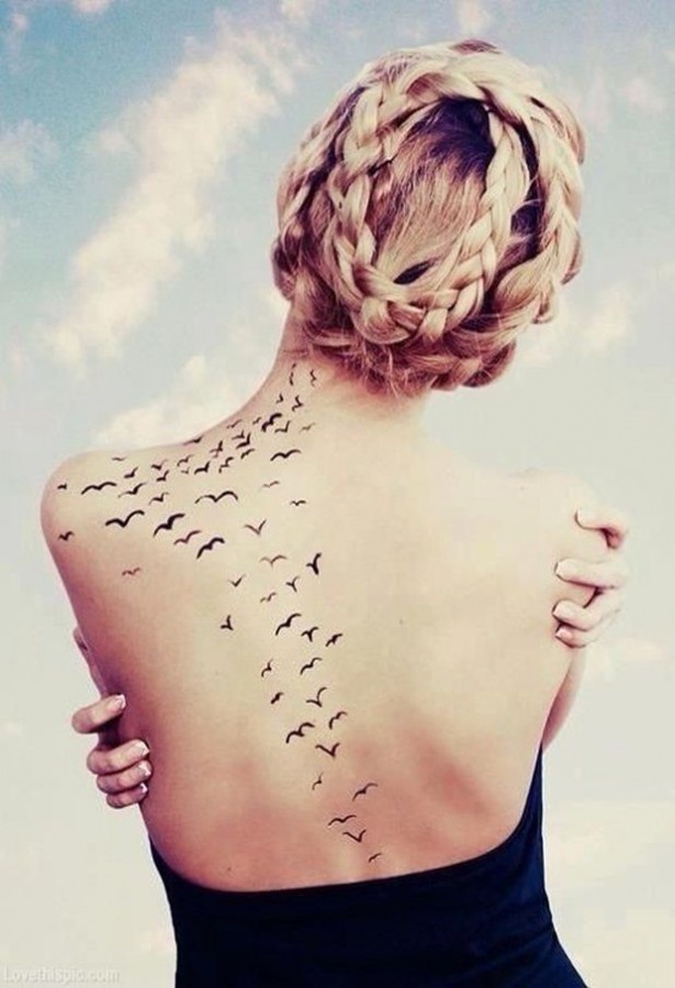 Black back birds tattoo