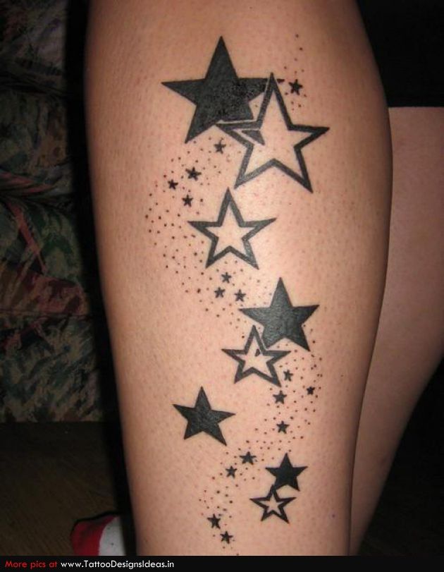 Black cool star tattoo on leg