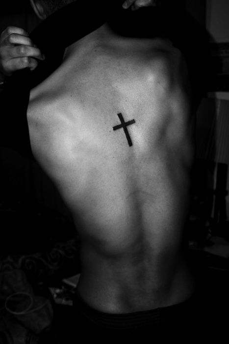 Black cross ornaments tattoo