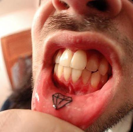 Black crystal lips tattoo