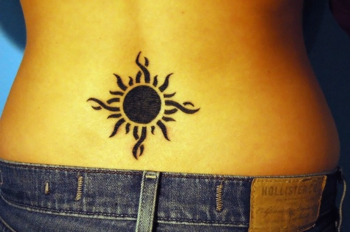 Black cute back sun tattoo