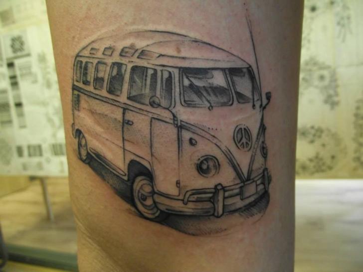 Black cute car tattoo on leg