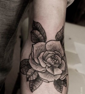 Black cute rose tattoo on arm