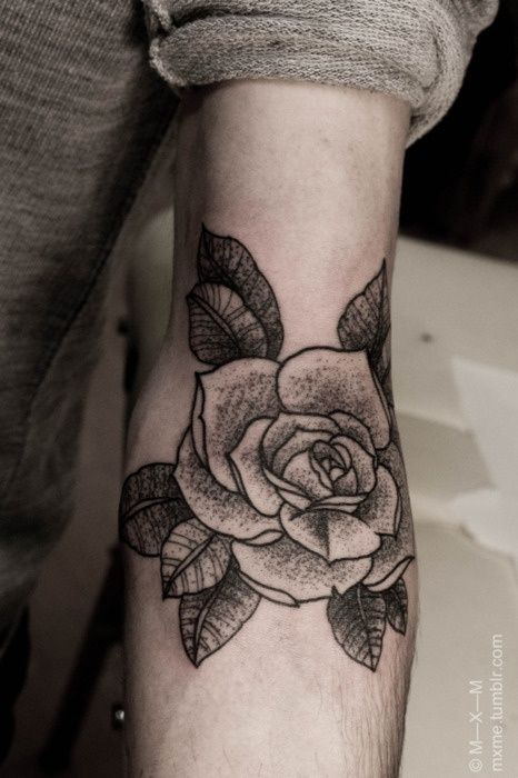 Black cute rose tattoo on arm