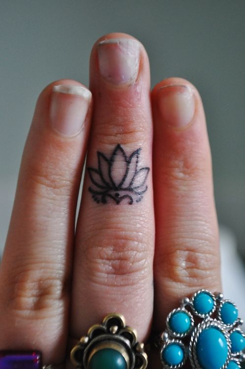 Black fingers ornaments tattoo