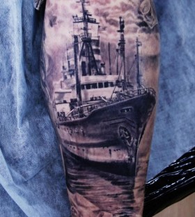 Black lovely ship tattoo on arm