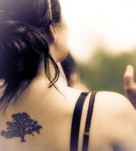 Black lovely tree tattoo on shoulder