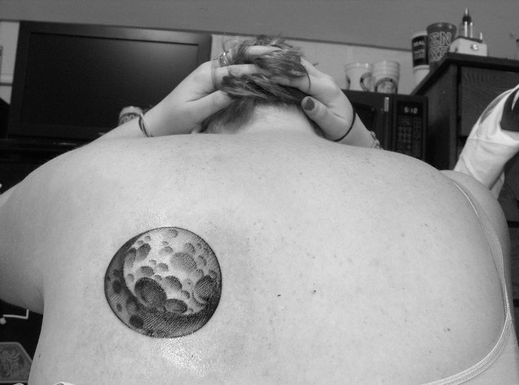 Black pretty women’s back moon tattoo