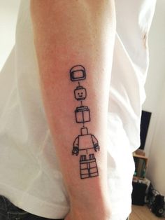 Black robbots line tattoo on leg