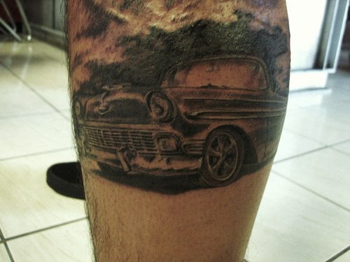 Black simple car tattoo on leg