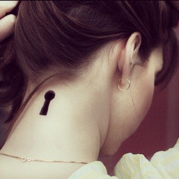 Black simple keyhole tattoo