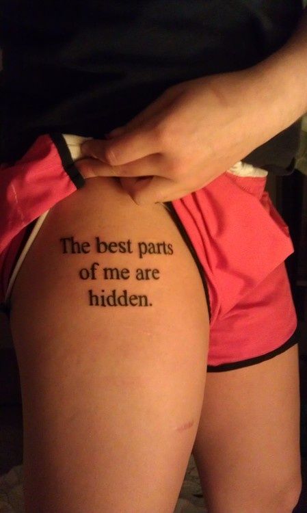 Black simple quote tattoo on leg