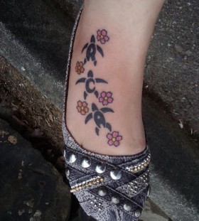 Black turtles and colorful flowers tattoo with shoes