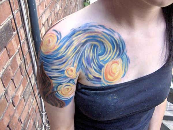 Blue shoulder watercolor incredible tattoo