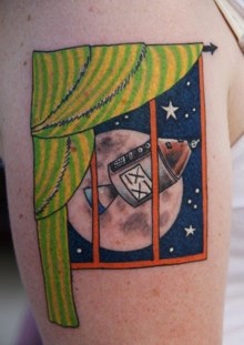 Blue star and window moon tattoo on shoulder