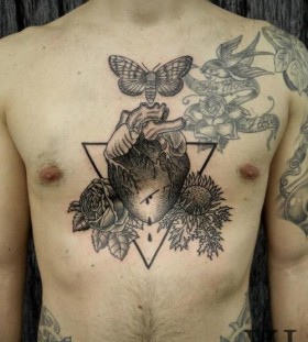 Butterfly and adorable flower tattoo on chest