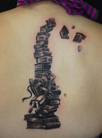 Chris Cockrill back book tattoo