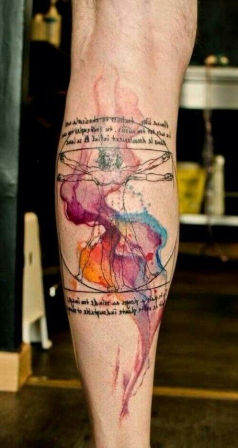 Colorful black quote tattoo on leg