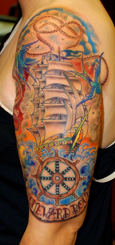 Colorful cute ship tattoo on arm