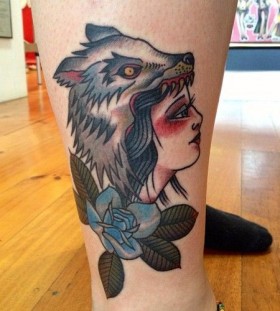 Colorful girl wolf tattoo on leg