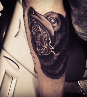 Cool black bear tattoo on arm