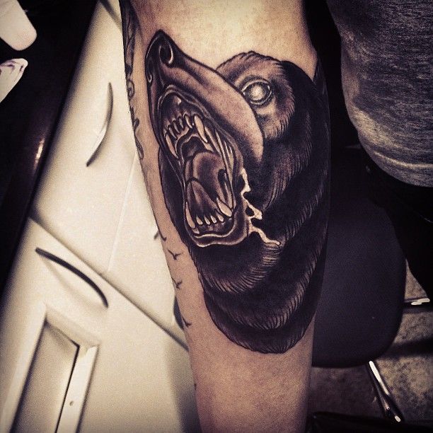 Cool black bear tattoo on arm