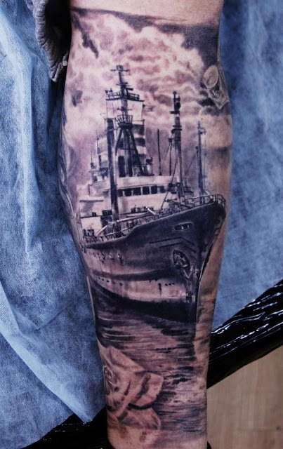 Cool black ship tattoo on arm