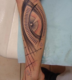Cool design of eye tattoo on leg