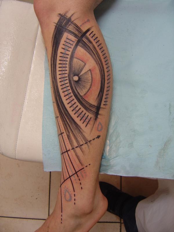 Cool design of eye tattoo on leg