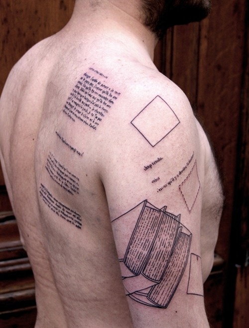 Cool men’s back book tattoo