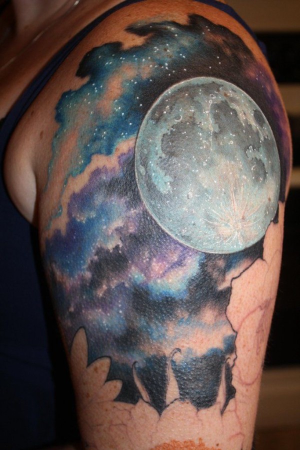 Cosmic colors moon tattoo on shoulder