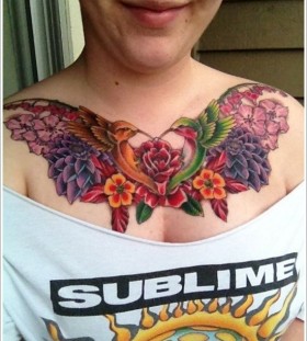 Cute birds and colorful flower tattoo on chest