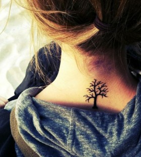 Cute black tree tattoo on shoulder