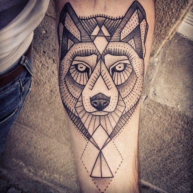 Cute black wolf tattoo on arm