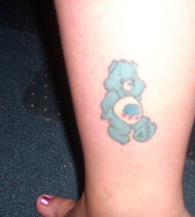 Cute blue bear tattoo on leg