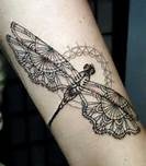 Cute butterfly lace tattoo on arm