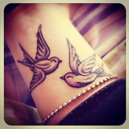 Cute couple of birds tattoo