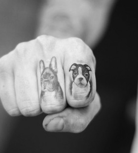 Cute dogs tattoo on finger