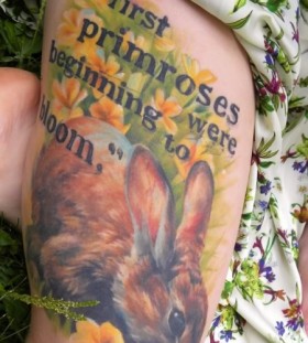 Cute flowers rabbit tattoo on body
