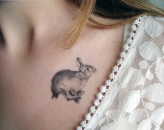 Cute girl rabbit tattoo on body