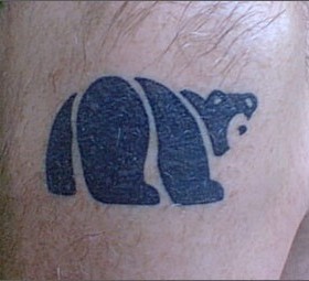 Cute simple bear tattoo on shoulder